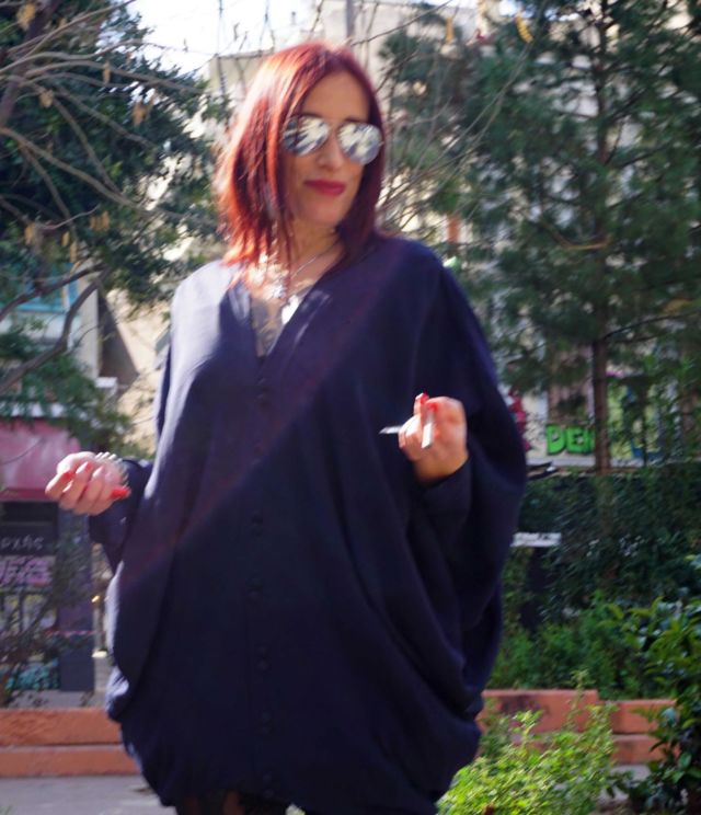 Photography adventure in Exarchia. A neighborhood in transition. The people make the space come alive. Bringing color, energy and movement to the square. Featuring a DIY design- the skirt transitions into a tunic. Many thanks to Dimitris Grammaticoyiannis and @ethicalodemag/ #nomorebusinessasusual #circularfashion #circulardesign #shoplocal #refashion #sustainablefashion @house.of.refashion #athensfashion #circulareconomy #exarchia #diyfashion #diyfashion #zerowaste #zerowastefashion